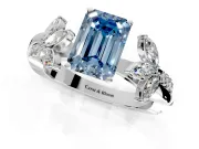 Floral Engagement Ring Setting for Fancy Blue Emerald Cut Center with Trailing Marquise Accents and Prong Head in Platinum