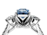 3 Stone Engagement Ring Setting for Fancy Blue Emerald Cut Center with Crossover Basket, Pave Band and Prong Head in White Gold