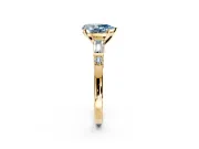 Bar-Set Engagement Ring Setting for Fancy Blue Pear-Shaped Center with Tapered Baguette Accents and Prong Head in Yellow Gold