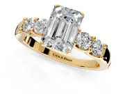 5 Stone Engagement Ring Setting for Emerald Cut Center with Plain Band and Prong Head in Yellow Gold