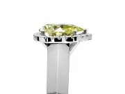 Halo Engagement Ring Setting for Fancy Yellow Pear-Shaped Center with Knife Ridge Cathedral Band and Prong Head in Sterling Silver