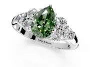 Cluster Engagement Ring Setting for Fancy Green Pear-Shaped Center with Round Cut Accent Frame and Prong Head in Sterling Silver