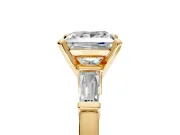 3 Stone Engagement Ring Setting for Princess Cut Center with Channel Baguette Accents and Prong Head in Yellow Gold
