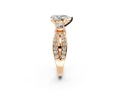 3 Stone Engagement Ring Setting for Pear-Shaped Center with Pave Twist Band and Prong Head in Rose Gold