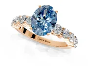 Shared-Prong Engagement Ring Setting for Fancy Blue Oval Center with Graduated Accents and Prong Head in Rose Gold