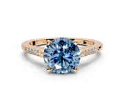 Solitaire Engagement Ring Setting for Fancy Blue Round Cut Center with Channel Accents and Prong Head in Rose Gold