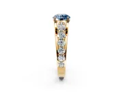 Solitaire Engagement Ring Setting for Fancy Blue Round Cut Center with Graduated Shared Prongs and Prong Head in Yellow Gold