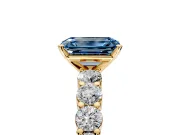 Shared-Prong Engagement Ring Setting for Fancy Blue Emerald Cut Center with Graduated Accents and Prong Head in Yellow Gold