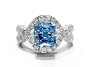 Halo Engagement Ring Setting for Fancy Blue Radiant Cut Center with Pave Infinity Twist Band and Prong Head in Platinum