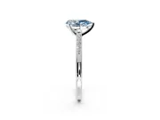 Solitaire Engagement Ring Setting for Fancy Blue Pear-Shaped Center with Channel Accents and Prong Head in Sterling Silver
