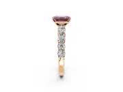 Shared-Prong Engagement Ring Setting for Fancy Pink Emerald Cut Center with Graduated Accents and Prong Head in Rose Gold