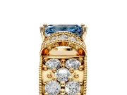 Pave Engagement Ring Setting for Fancy Blue Emerald Cut Center with Curved Accent Rows, Openwork and Prong Head in Yellow Gold