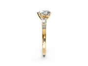 Bar-Set Engagement Ring Setting for Heart-Shaped Center with Tapered Baguette Accents and Prong Head in Yellow Gold