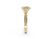 Cluster Engagement Ring Setting for Fancy Yellow Pear-Shaped Center with Bezel Accent Clusters and Prong Head in Yellow Gold