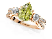 3 Stone Engagement Ring Setting for Fancy Yellow Pear-Shaped Center with Pave Split Shank and Prong Head in Rose Gold