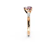 3 Stone Engagement Ring Setting for Fancy Pink Heart-Shaped Center with Tapered Baguettes, Plain Band and Prong Head in Rose Gold