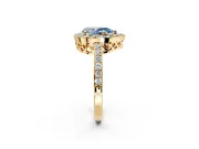 Halo Engagement Ring Setting for Fancy Blue Pear-Shaped Center with Heart-Shaped Openwork, Pave Band and Prong Head in Yellow Gold