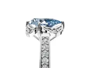 Floral Engagement Ring Setting for Fancy Blue Pear-Shaped Center with Four Accent Clusters and Prong Head in Platinum