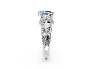 Solitaire Engagement Ring Setting for Fancy Blue Pear-Shaped Center with Filigree Accent Basket and Prong Head in Platinum