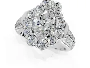 Large Accent Halo Engagement Ring Setting for Pear-Shaped Center with Pave Split Shank and Prong Head in White Gold