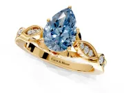 Solitaire Engagement Ring Setting for Fancy Blue Pear-Shaped Center with Marquise and Bezel Accents and Prong Head in Yellow Gold