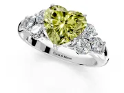 Cluster Engagement Ring Setting for Fancy Yellow Heart-Shaped Center with Round Cut Accent Frame and Prong Head in Platinum