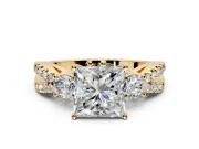 3 Stone Engagement Ring Setting for Princess Cut Center with Pave Split Shank and Prong Head in Yellow Gold