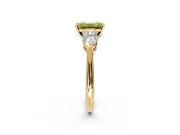 3 Stone Engagement Ring Setting for Fancy Yellow Emerald Cut Center with Large Pear-Shaped Accents and Prong Head in Yellow Gold