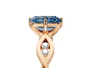 Solitaire Engagement Ring Setting for Fancy Blue Emerald Cut Center with Accented Twist Band and Leaf Prong Head in Rose Gold