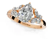 Solitaire Engagement Ring Setting for Pear-Shaped Center with Marquise Flower Shoulders and Prong Head in Rose Gold
