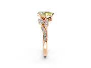 Solitaire Engagement Ring Setting for Fancy Yellow Pear-Shaped Center with Marquise Accent Twist Band and Prong Head in Rose Gold