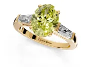 3 Stone Engagement Ring Setting for Fancy Yellow Oval Center with Tapered Baguettes, Plain Band and Prong Head in Yellow Gold