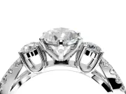 3 Stone Engagement Ring Setting for Pear-Shaped Center with Pave Split Shank and Prong Head in Platinum