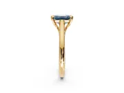 Solitaire Engagement Ring Setting for Fancy Blue Emerald Cut Center with Cathedral Band and Prong Head in Yellow Gold