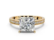 Solitaire Engagement Ring Setting for Princess Cut Center with Channel-Set Accent Band and Prong Head in Yellow Gold
