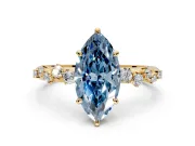Cluster Engagement Ring Setting for Fancy Blue Marquise Center with Round Cut Accent Band and Prong Head in Yellow Gold