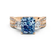 3 Stone Engagement Ring Setting for Fancy Blue Radiant Cut Center with Pave Twist Band and Prong Head in Rose Gold