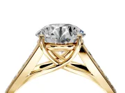 Solitaire Engagement Ring Setting for Round Cut Center with Cathedral Channel Band and Prong Head in Yellow Gold