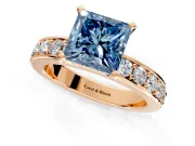 Solitaire Engagement Ring Setting for Fancy Blue Princess Cut Center with Channel-Set Accents and Prong Head in Rose Gold