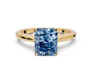 Solitaire Engagement Ring Setting for Fancy Blue Radiant Cut Center with Narrow Cathedral Band and Prong Head in Yellow Gold