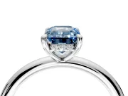 Hidden Halo Engagement Ring Setting for Fancy Blue Emerald Cut Center with Thin Rounded Band and Prong Head in Platinum