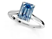 Solitaire Engagement Ring Setting for Fancy Blue Emerald Cut Center with Narrow Cathedral Band and Prong Head in Platinum