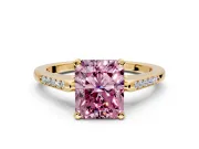 Solitaire Engagement Ring Setting for Fancy Pink Radiant Cut Center with Channel Accents and Prong Head in Yellow Gold