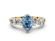 5 Stone Engagement Ring Setting for Fancy Blue Pear-Shaped Center with Graduated Accents and Prong Head in Yellow Gold