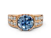 Bezel Engagement Ring Setting for Fancy Blue Round Cut Center with Wide Channel-Set Band and Bezel Head in Rose Gold