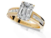 Solitaire Engagement Ring Setting for Emerald Cut Center with Princess Cut Channel Band and Prong Head in Yellow Gold