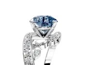 Solitaire Engagement Ring Setting for Fancy Blue Round Cut Center with Pave Bypass Twist Band and Prong Head in Platinum