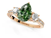 3 Stone Engagement Ring Setting for Fancy Green Pear-Shaped Center with Round Cut Side Accents and Prong Head in Rose Gold