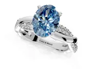 Solitaire Engagement Ring Setting for Fancy Blue Oval Center with Pave and Plain Crossover and Basket Head in White Gold