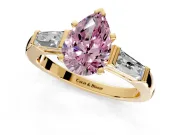3 Stone Engagement Ring Setting for Fancy Pink Pear-Shaped Center with Tapered Baguettes, Plain Band and Prong Head in Yellow Gold